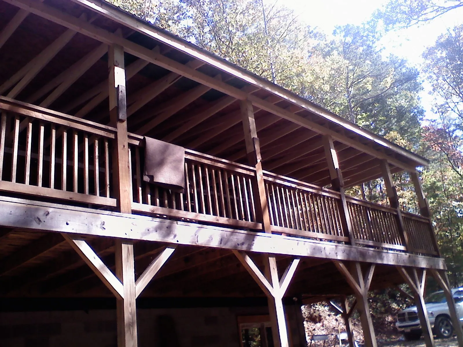 Timber framing under a new elevated porch and deck — Roof Leak Repair in Butte Falls by Roofing Brothers